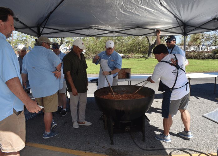 Liskow & Lewis cook for storm victims at United Way of Southwest Louisiana's Cameron Louisiana relief site