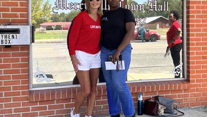 two women with envelope