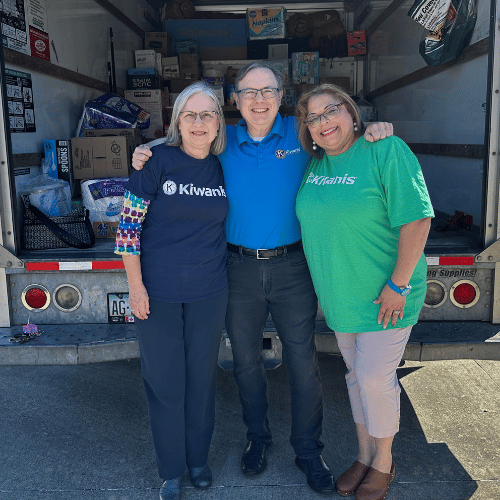 3 people with hurricane supplies